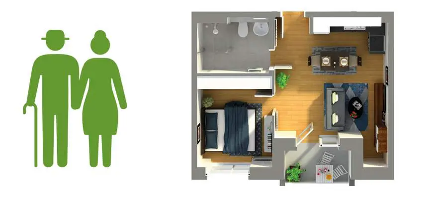 Ein grünes Symbol eines älteren Mannes mit Stock und einer Frau steht neben einem Grundriss, der eine Ein-Zimmer-Wohnung mit Schlafzimmer, Bad, Küche, Essbereich und Wohnzimmer zeigt.