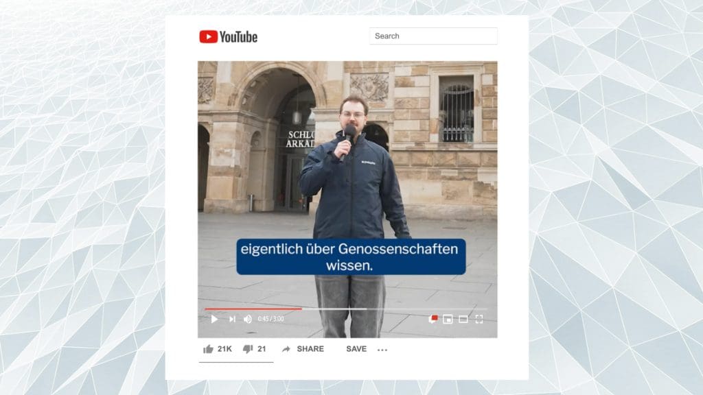 Bild: Hintergrund © iStockphoto.com/Mykyta Dolmatov Ein Screenshot eines YouTube-Videos auf dem ein Mann mit Mikrofon zu sehen ist.